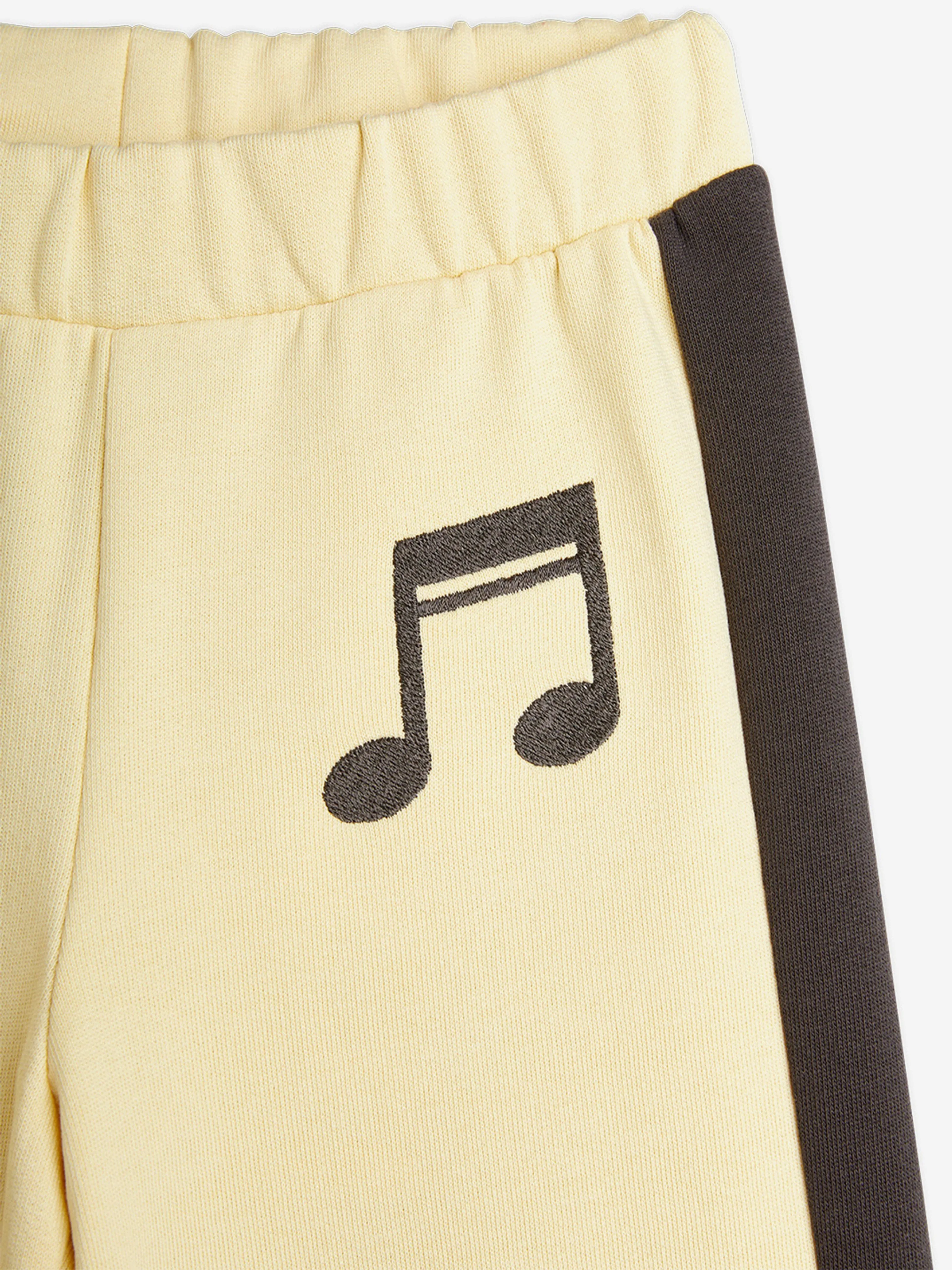 Girls Note Embroidered Joggers in Yellow
